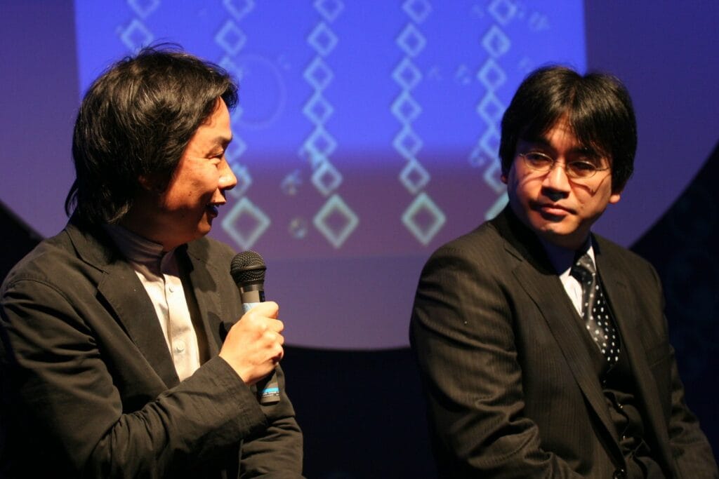 Nintendo's Shigeru Miyamoto and Satoru Iwata at the Electroplankton launch event in April 2005, one of the Nintendo DS era sets in the collection. Photo: Colin Williamson / Video Game History Foundation.